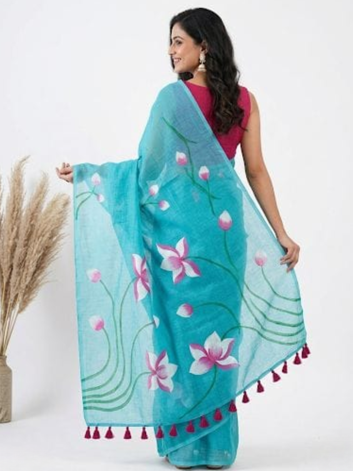 Trendy Aqua Lotus Printed Saree with Tassel Border