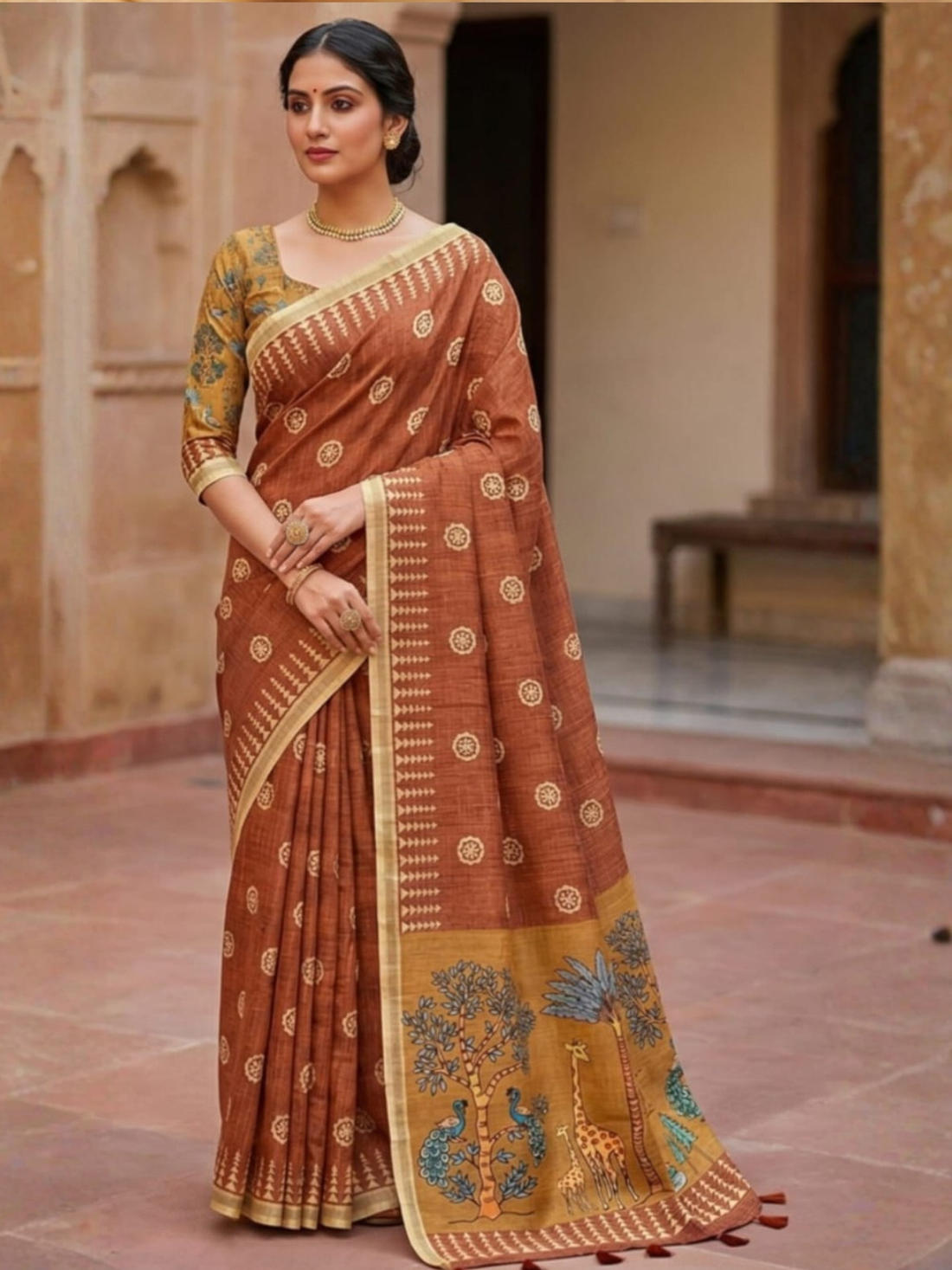 Elegant Rust Brown Printed Saree with Traditional Animal Pallu