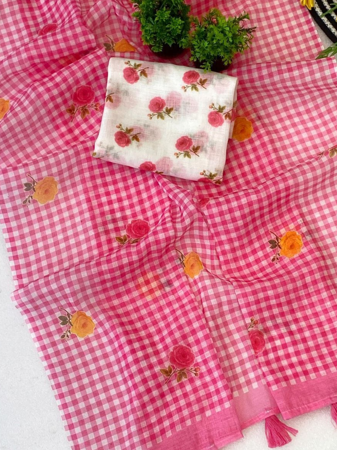 Chic Pink Check Saree with Floral Design