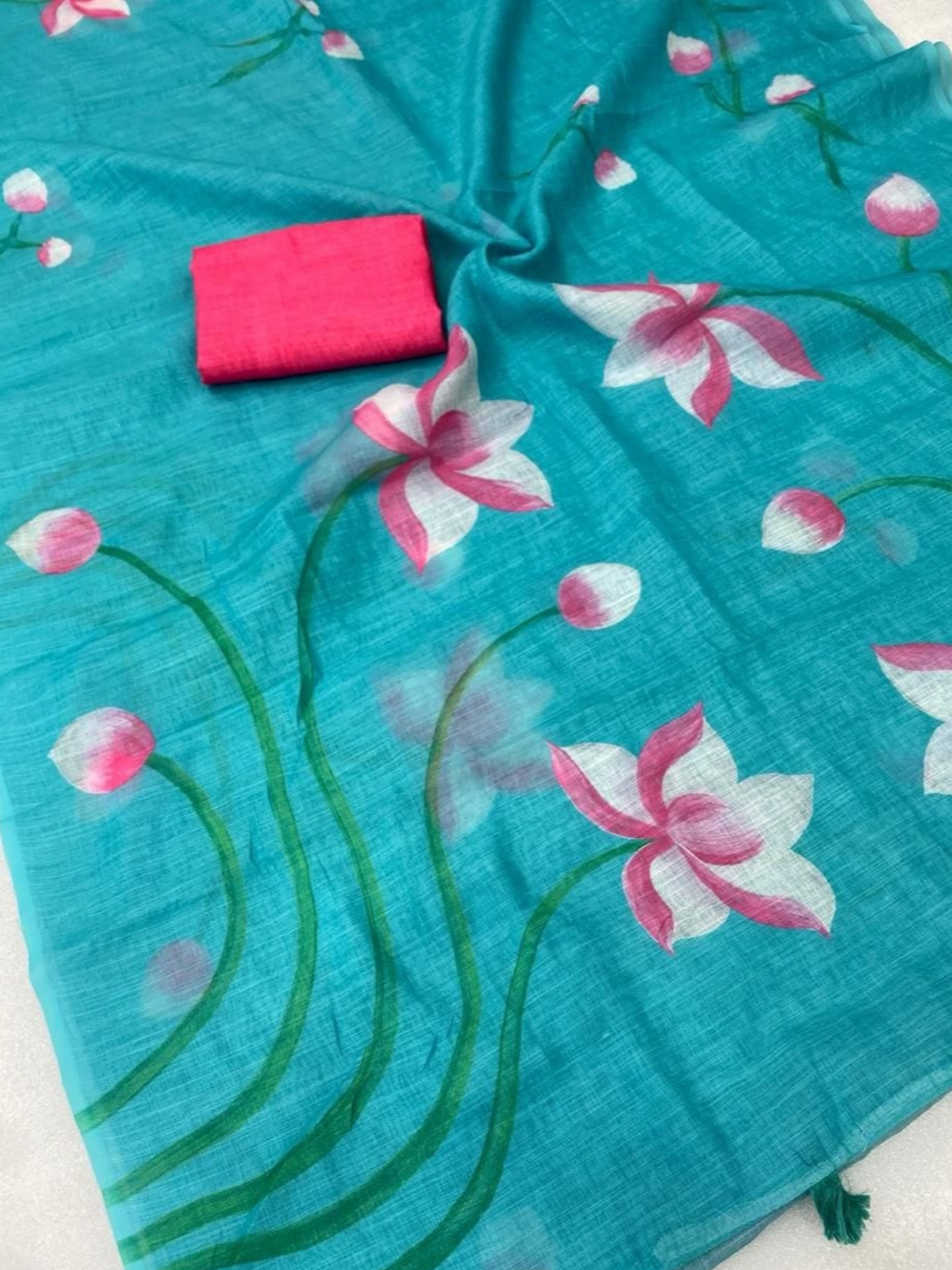 Trendy Aqua Lotus Printed Saree with Tassel Border