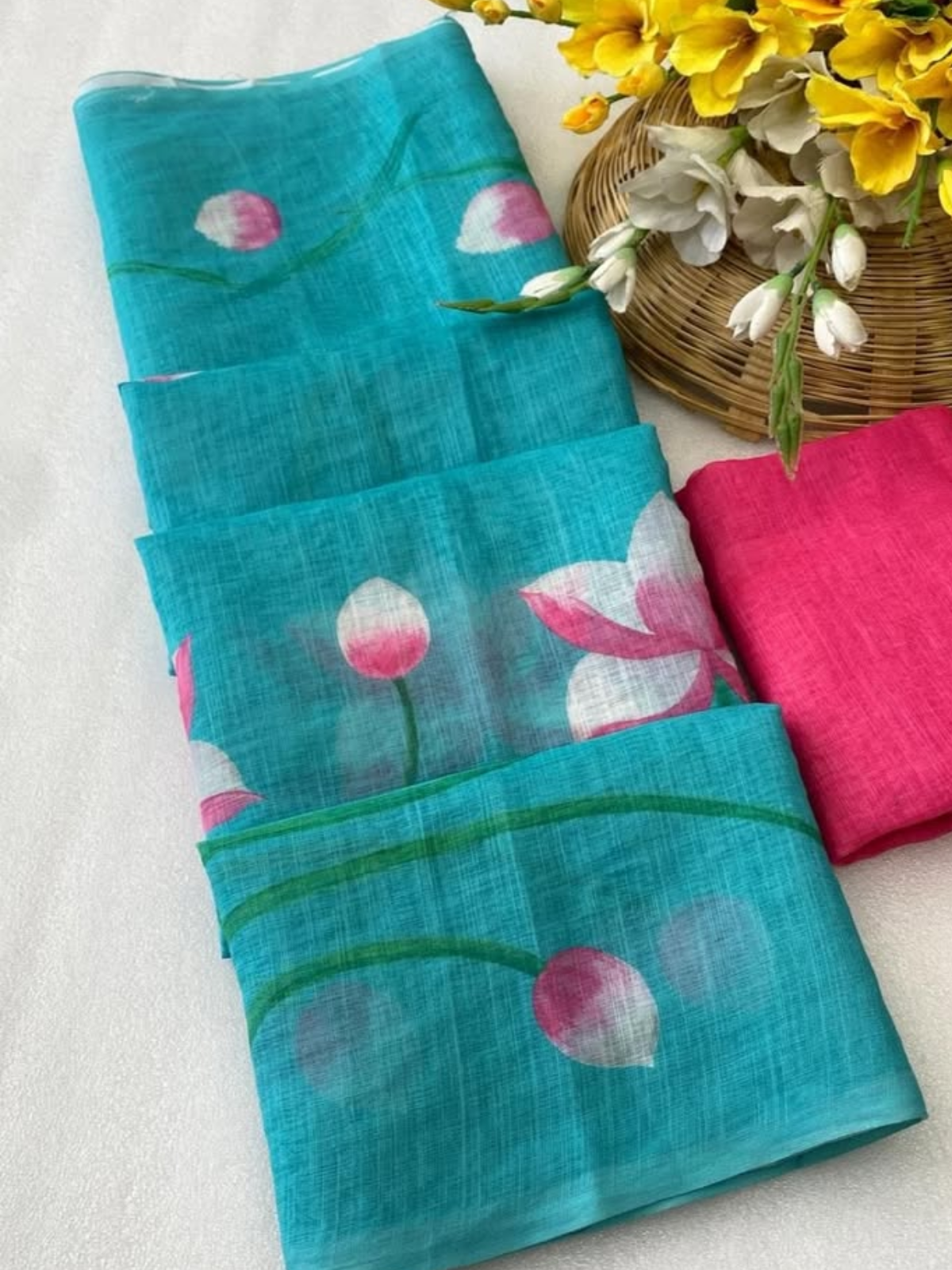 Trendy Aqua Lotus Printed Saree with Tassel Border