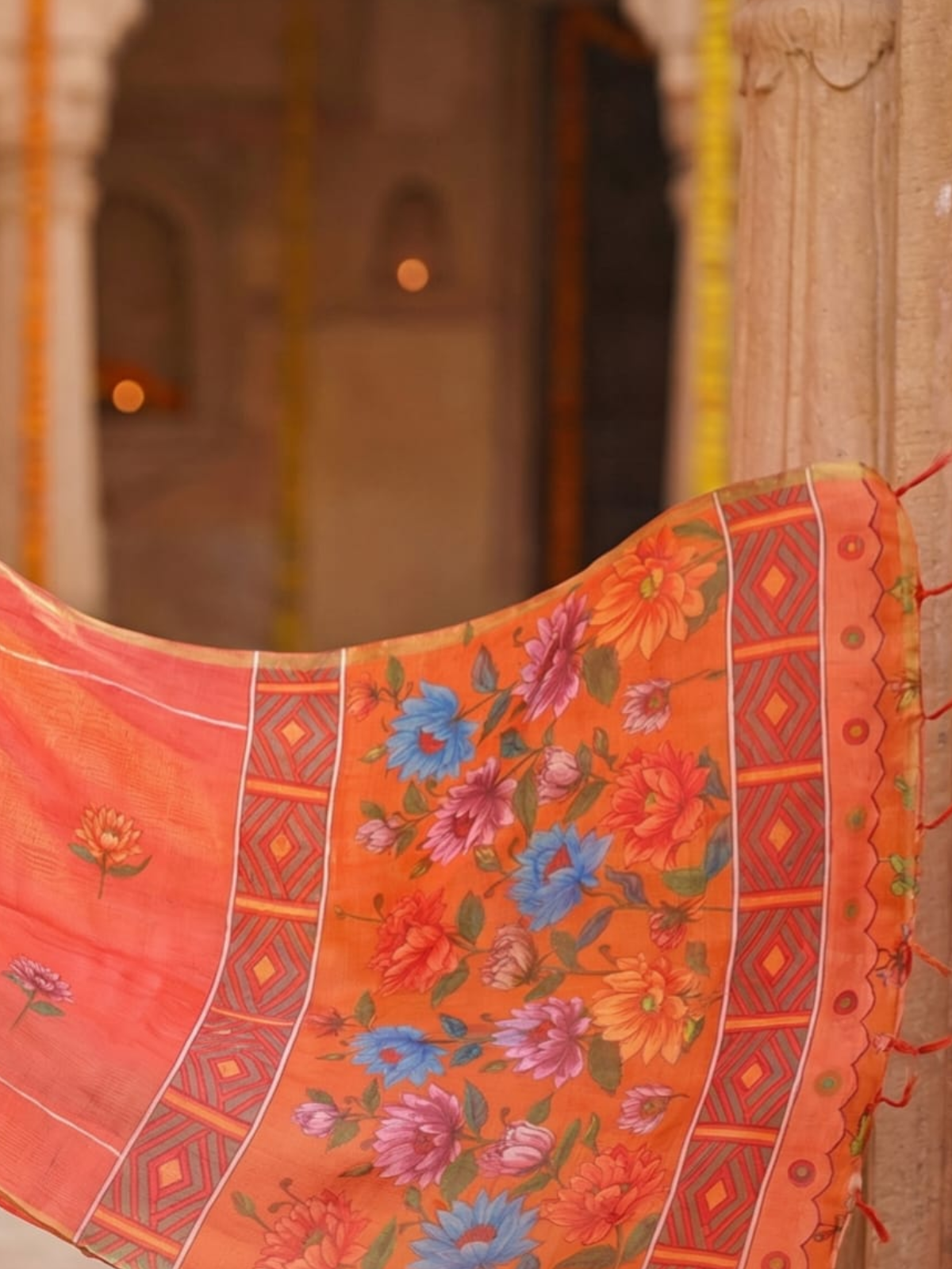 Orange Linen Saree with Soft Floral Design