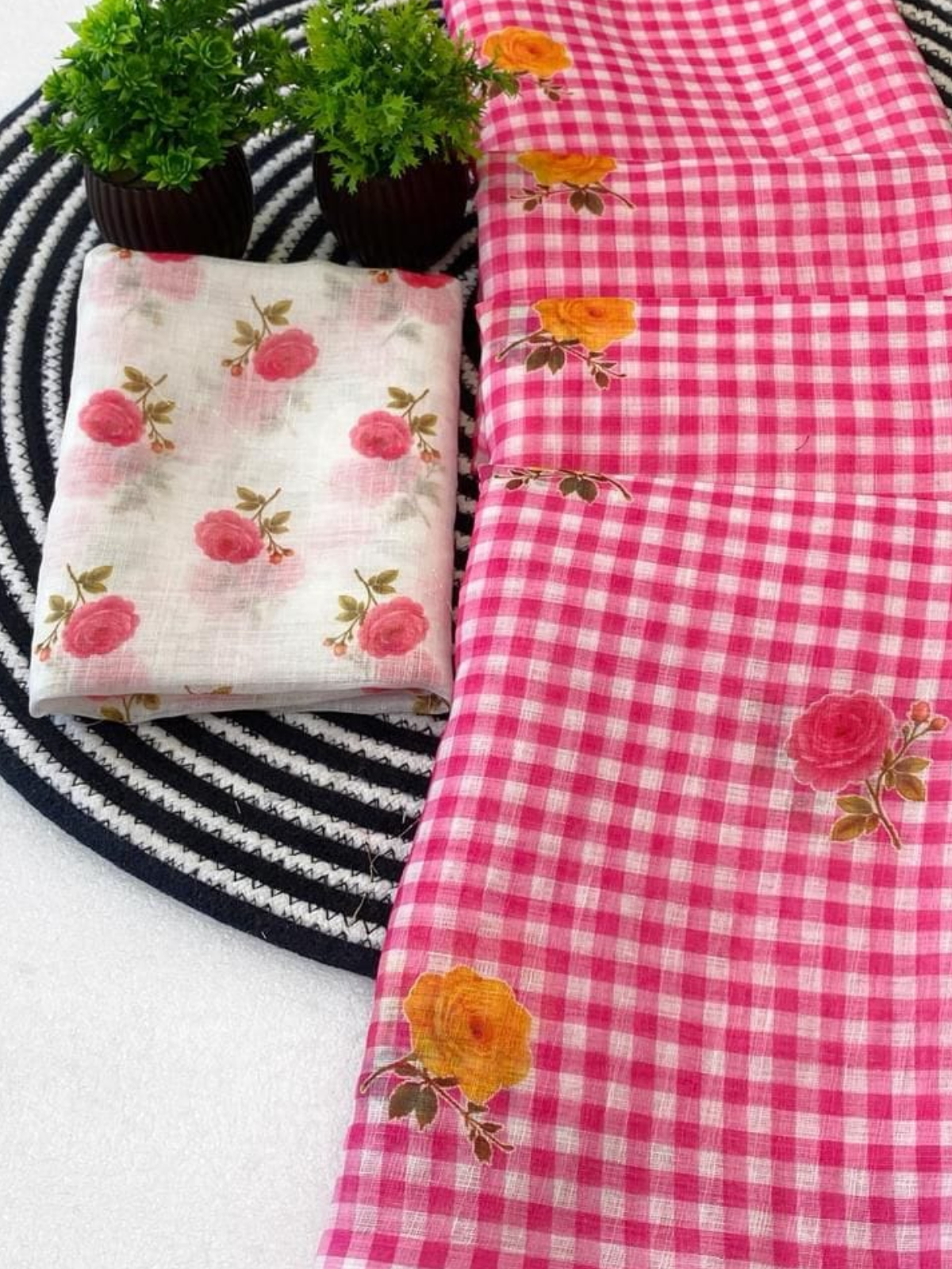 Chic Pink Check Saree with Floral Design