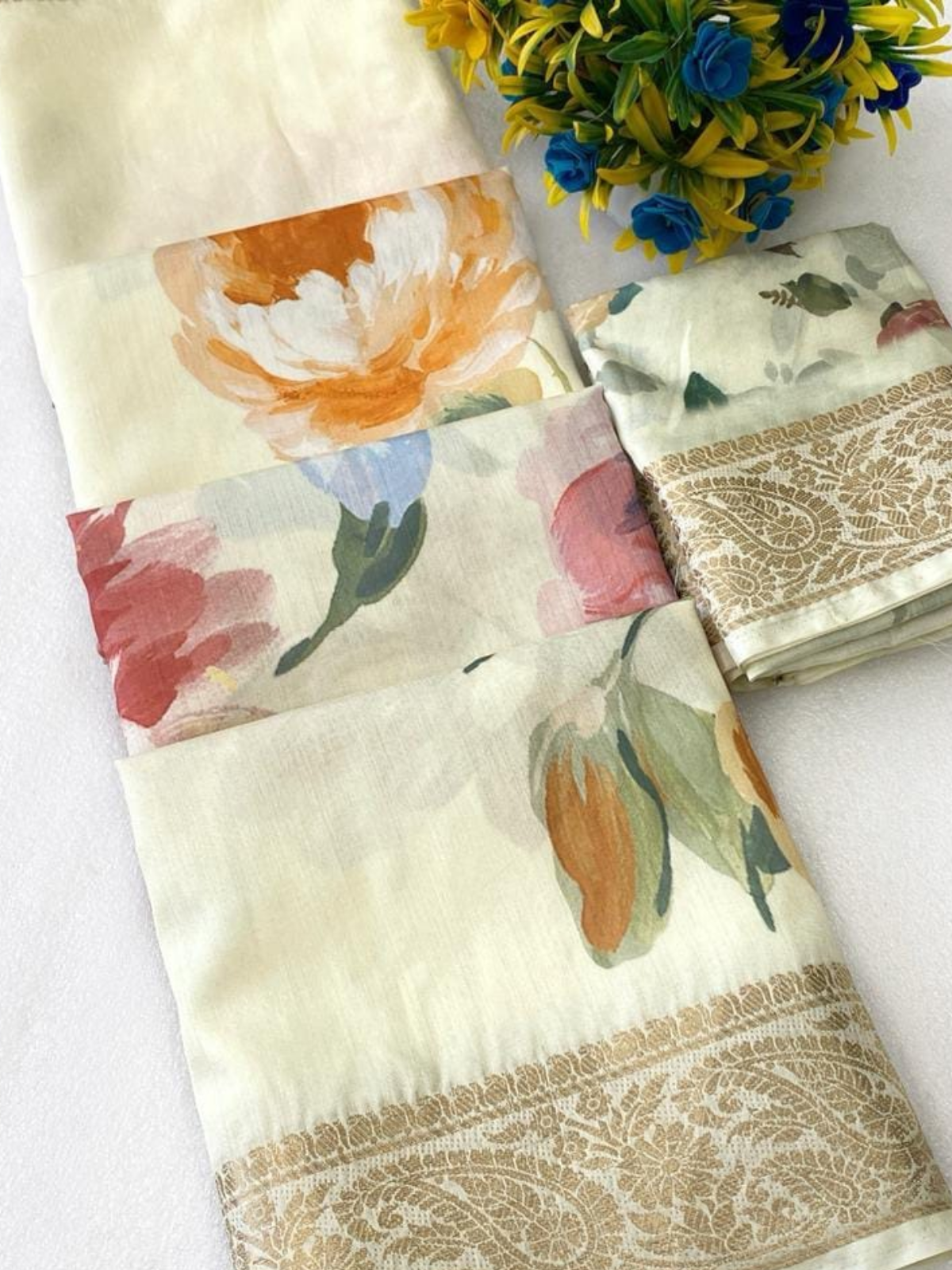 Pastel Floral Cream Saree with Golden Border
