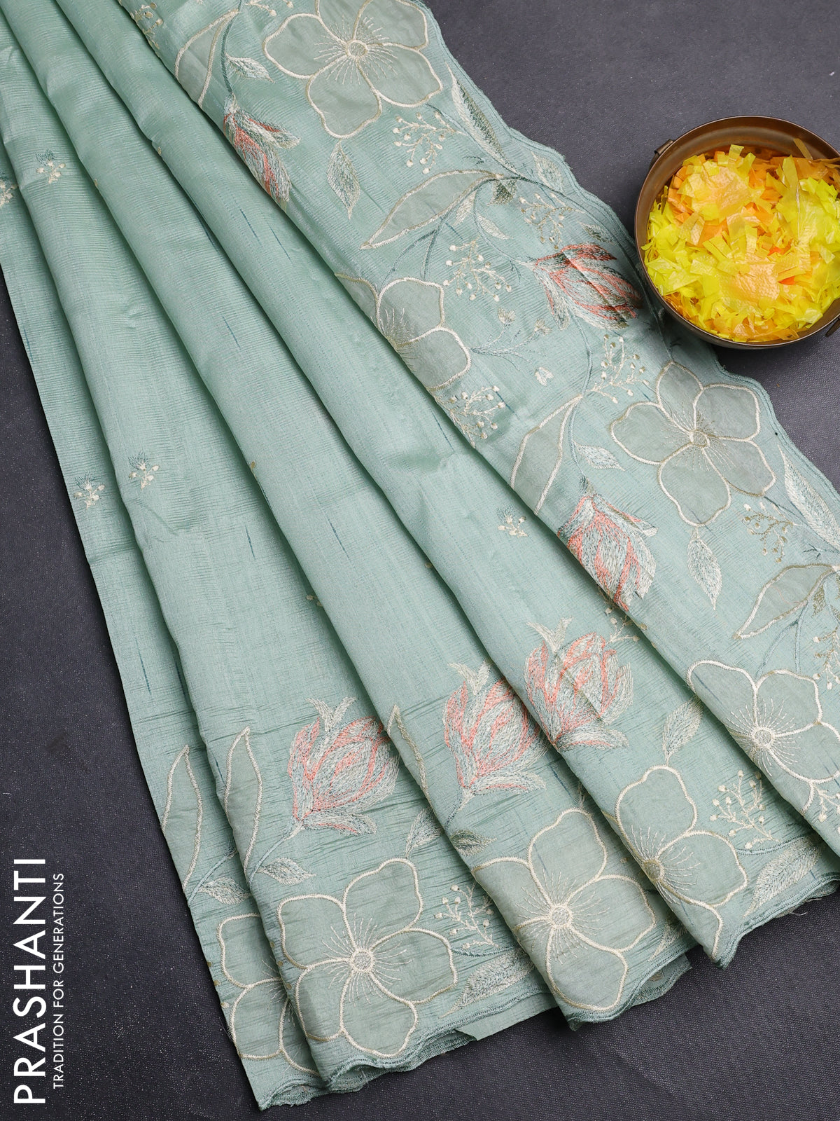 Semi raw silk saree pastel green with embroidery work buttas and floral embroidery border
