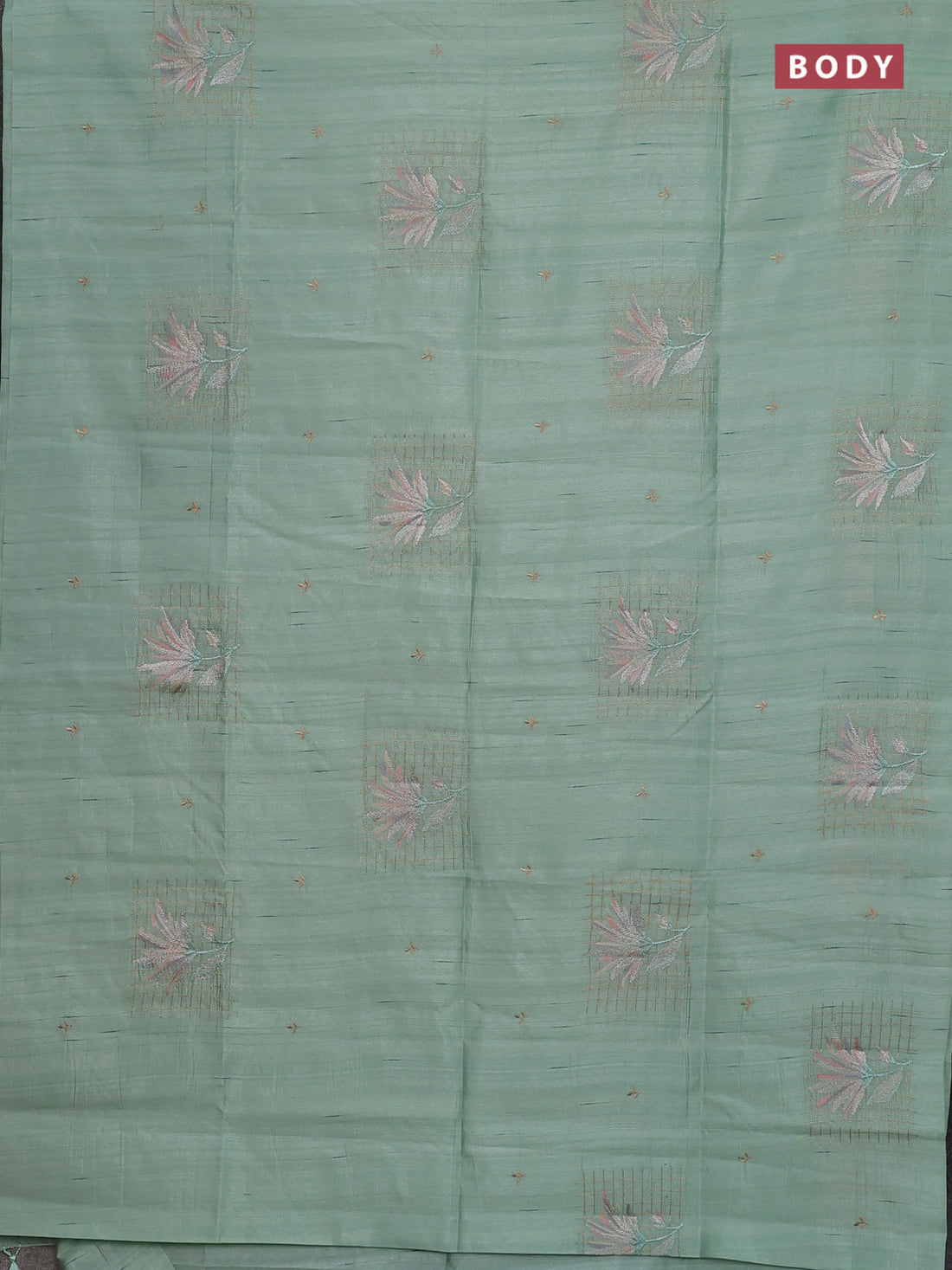 Semi raw silk saree pastel green with embroidery buttas and embroidery butta border