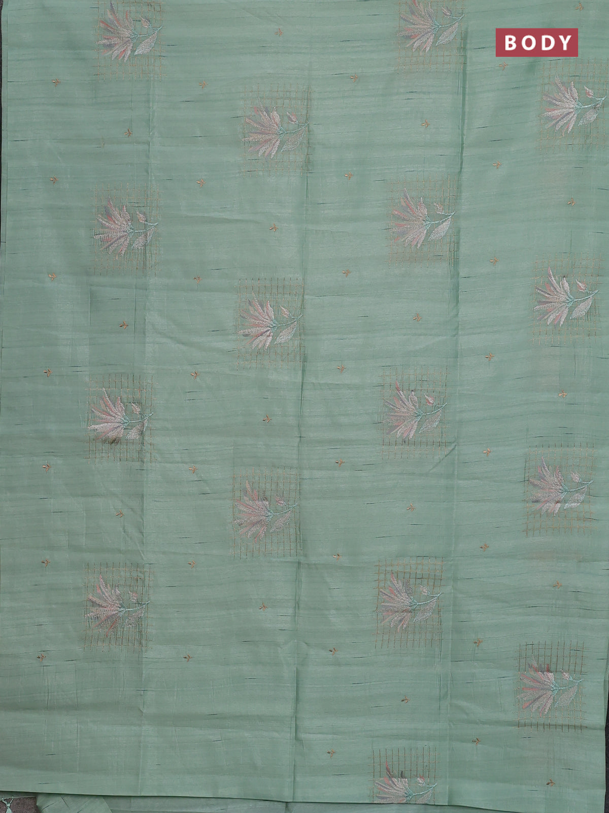 Semi raw silk saree pastel green with embroidery buttas and embroidery butta border