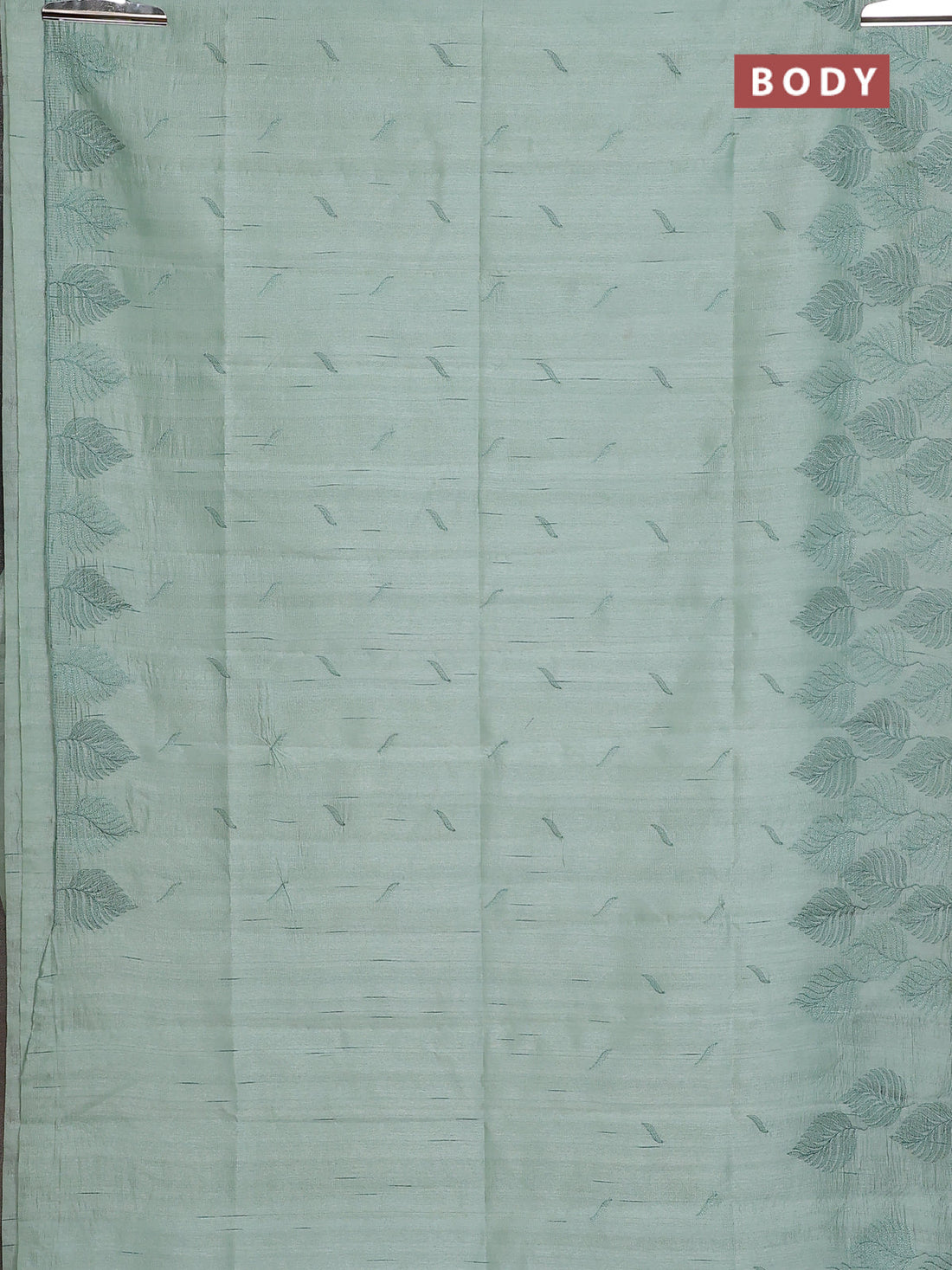 Semi raw silk saree pastel green with embroidery buttas and leaf embroidery border