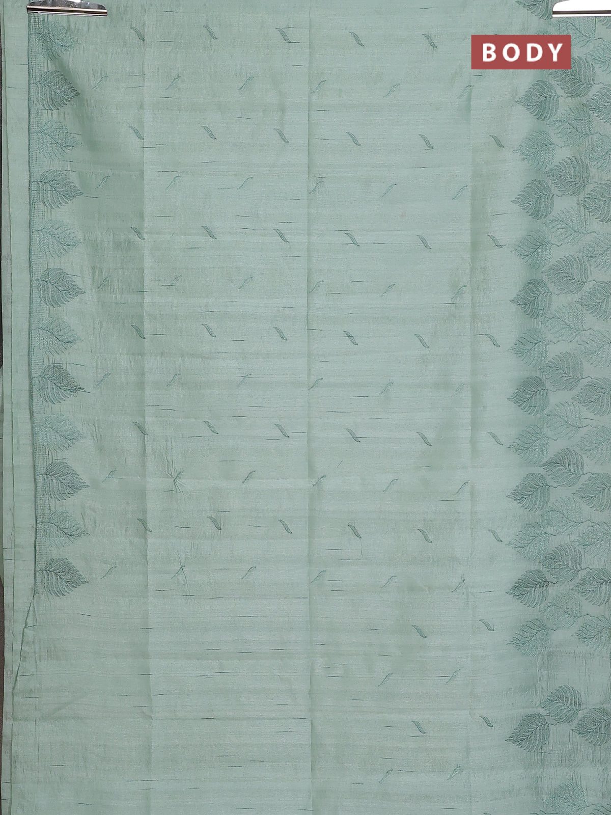Semi raw silk saree pastel green with embroidery buttas and leaf embroidery border