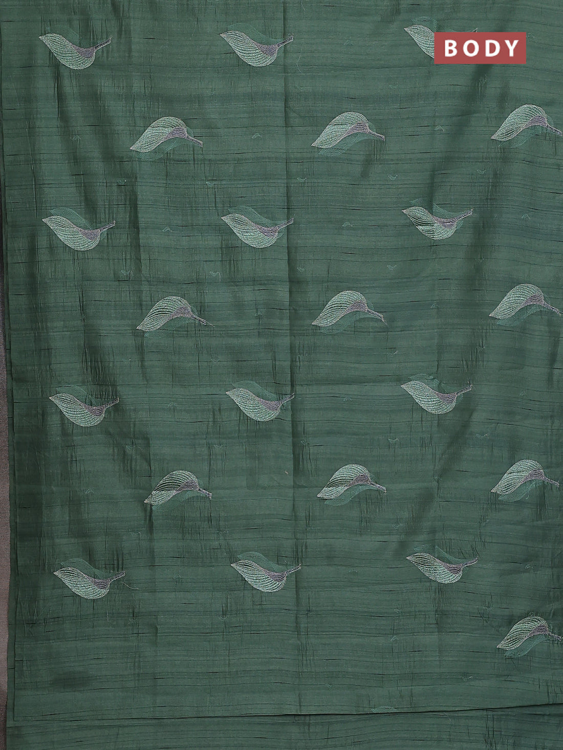 Semi raw silk saree green shade with leaf embroidery buttas in borderless style