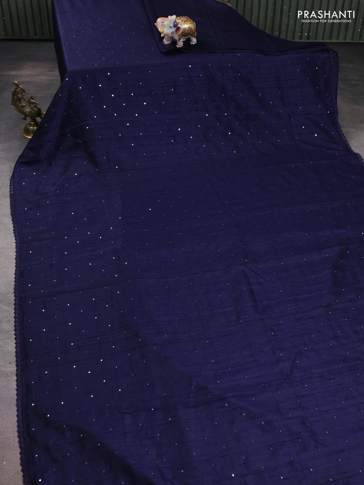 Semi raw silk saree navy blue with allover mirror work and lace work border